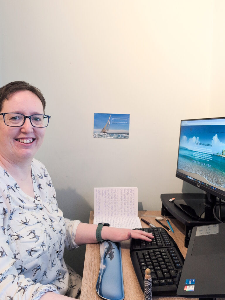 picture of Louise at her desk